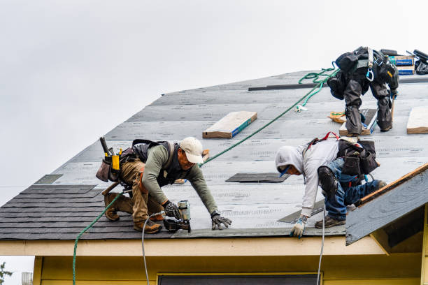 Professional Gutter Installation technician working in Athens, WV